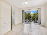 BEACHSIDE LIVING: 1 BEDROOM APARTMENT WITH POOL IN PRIME...