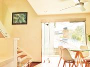 Beachside Oasis with Modern Comforts & Tranquil Tree...