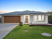 Beautiful Family Home With Impressive Raked Ceilings And...