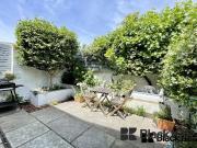 Beautiful garden flat marrying period charm with...