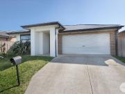 BEAUTIFULLY KEPT HOME IN GROWING AREA