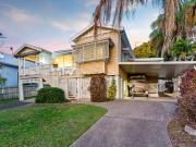 Beautifully Presented Queenslander in the Heart of It All! Beautifully Presented Queenslander in the Heart of It All!