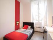 Bed in a charming twin bedroom, in La Fontana