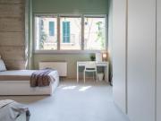 Bed in a twin bedroom near Famagosta Ospedale San Paolo...