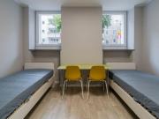 Bed in an ensuite twin bedroom near Technische...