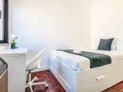 Bedroom in a 10 Bedroom Apartment in Rua Conde de...