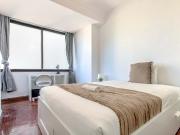 Bedroom in a 10 Bedroom Apartment in Rua Conde de...