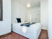 Bedroom in a 10 Bedroom Apartment in Rua Conde de...