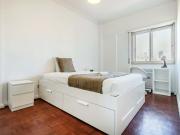 Bedroom in a 10 Bedroom Apartment in Rua Conde de...