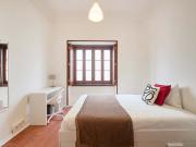 Bedroom in a 11 Bedroom Apartment in Rua de Buenos...