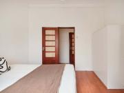 Bedroom in a 11 Bedroom Apartment in Rua de Buenos...