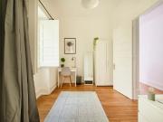 Bedroom in a 7 bedroom apartment in R. Alexandre...