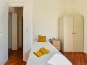 Bedroom in a 7 bedroom apartment in R. David Lopes,...