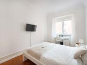 Bedroom in a 7 Bedroom Apartment in Rua Joaquim António...
