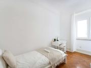 Bedroom in a 7 Bedroom Apartment in Rua Joaquim António...