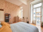 Bedroom in a 7 bedroom apartment in Rua Tomás da...