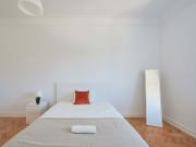 Bedroom in a 9 Bedroom Apartment in Rua Jorge Ferreira...