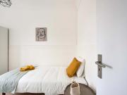 Bedroom in a 9 bedroom apartment in Rua Morais Soares,...