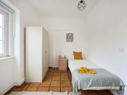 Bedroom in a 9 bedroom apartment in Rua Morais Soares,...