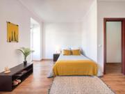 Bedroom with balcony in a 6 bedroom apartment in Lisbon...