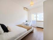 Bedroom with balcony in a 9 Bedroom Apartment in Rua...