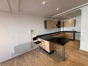 Bel appartement en location à Racine. 2 chambres. Places...