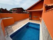 Belíssima casa com Piscina apenas a vista lado praia em...