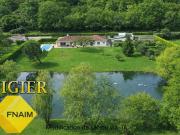 Belle propriété de plain pied avec étang et piscine, à 5...