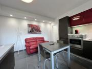 Bilocale nuovo arredato + posto auto al coperto...