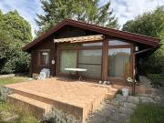 Blockbohlenhaus mit Wintergarten und Doppelgarage auf...