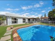 Boasting a Pool & a Shed