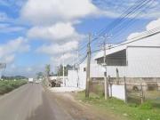 Bodega y terreno a pie de carretera, saliendo de...