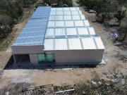 Bodegas NUEVAS en Puerto Aventuras a 100 m de Blvd Colosio