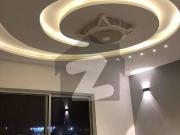 Brand New 10 Marla Modern Brick & Concrete Masterpiece...