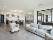 BRAND NEW DESIGNER HOME IN PRESTIGIOUS CALYPSO BAY