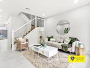 BRAND NEW TOWNHOUSE READY TO MOVE IN! Walk to Shops and...