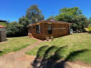 Brick Home with Shedding