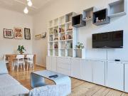 Bright and modern apartment with classic charm in...