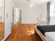 Bright bedroom in a 6 bedroom apartment in Lisbon Room 4