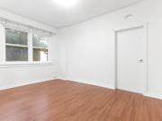 Bright one bedroom plus sunroom in a classic Art Deco block