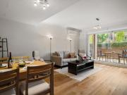 Bright Two Level Townhouse Style Apartment in the Heart...