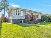 Bungalow For Sale With Legal Basement Suite. 5 Beds 2 Bath