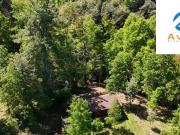Caburgua parcela de 5.037m2 con casa 3 D 1 B, agua...