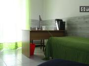 Camera arredata in appartamento con 3 camere da letto in...