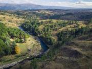 Campo 10ha con costa de Río San Miguel Escritura