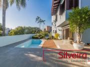 Casa 4 dormitórios com 394m² de área privativa. Chácara...