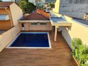 Casa com 4 dormitórios à venda, 180 m² por R$...
