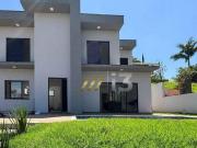 Casa com 4 dormitórios à venda, 204 m² por R$...