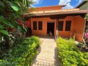 Casa com 6 dormitórios à venda, 315 m² por R$...