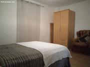 CASA ADOSADA EN EL TRANQUILO BARRIO ABATEL